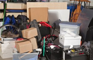 Pile of boxes junk inside a residential garage