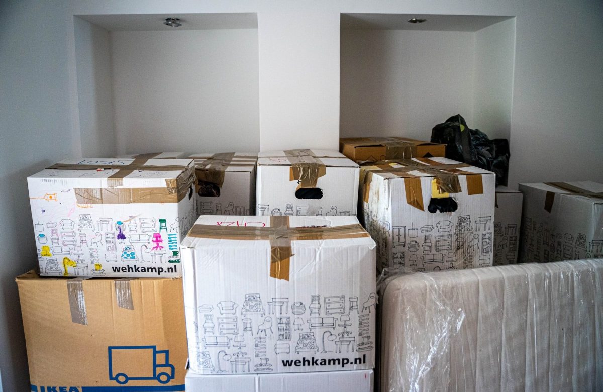 boxes stacked up filling a room